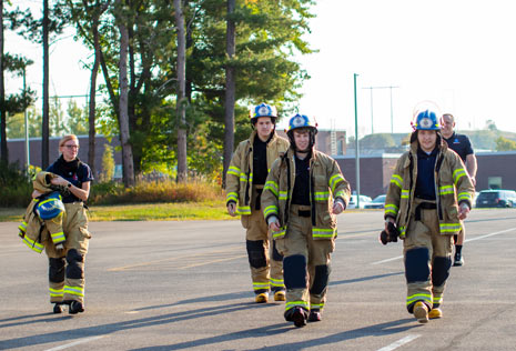 FireMedic students walking in parking lot at college