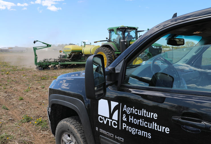 Agriculture and Horticulture vehicle with tractor in background