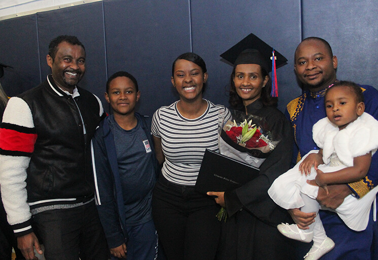 Smiling Family with Graduate