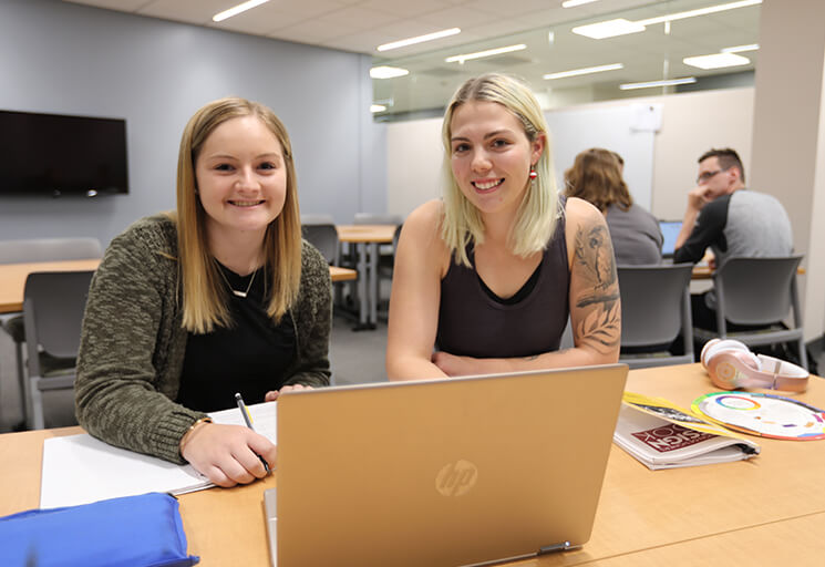 Two Girls w/ Laptop